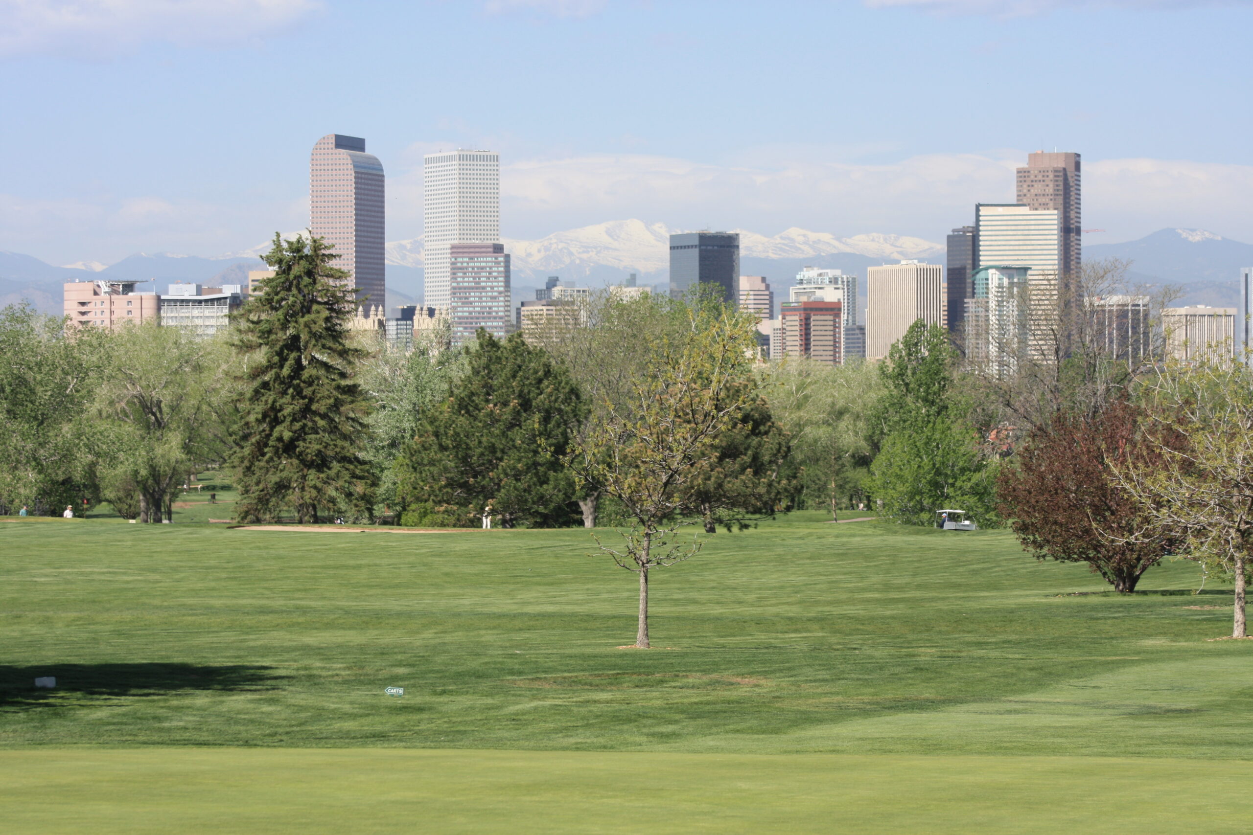 Denver skyline with Mount Evans and the Rocky Mountains in the background